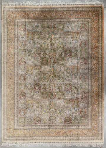 An Oriental hand-made carpet, Silk, Ghoum. (L: 379 x W: 280 ...