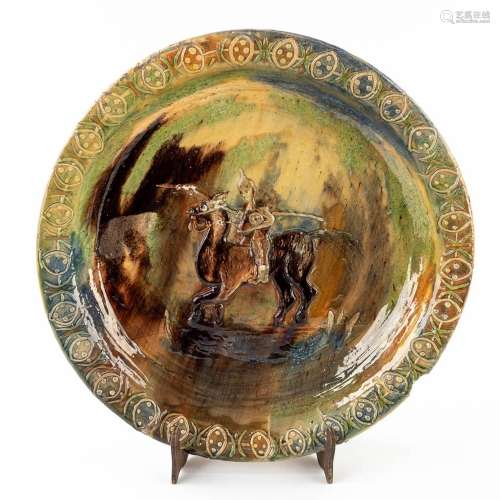 An antique display plate Flemish Earthenware, German rider w...