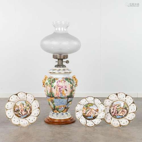 Capodimonte, a large table lamp and 3 plates. Glazed faience...