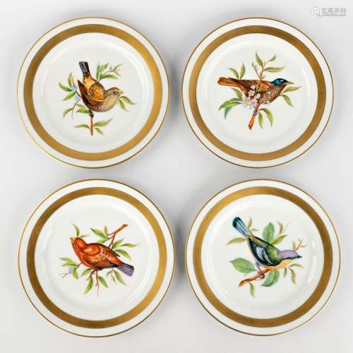 Sèvres porcelain, a set of 4 plates decorated with birds. 20...