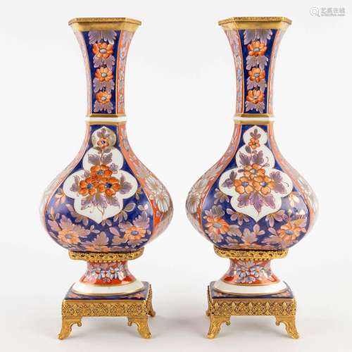 Limoges, a pair of vases with a Chinoiserie decor. 20th cent...