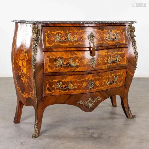 A commode, marquetry inlay and mounted with bronze and a mar...