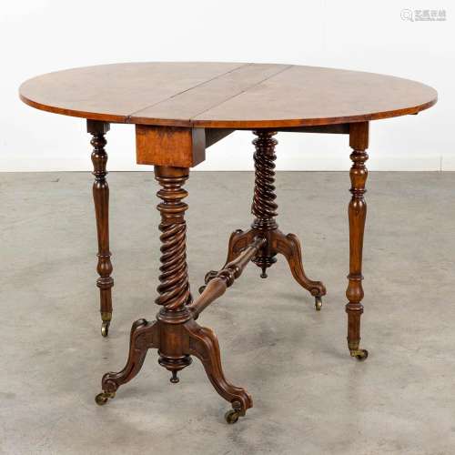 A dropleaf table with turned legs, and walnut burlwood venee...