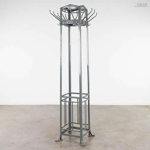 A metal coathanger in the style of Gustave SERRURIER BOVY (1...