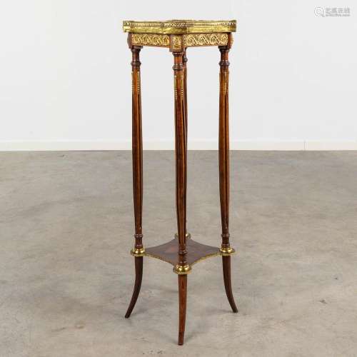 A pedestal mounted with bronze and marble in Louis XVI style...