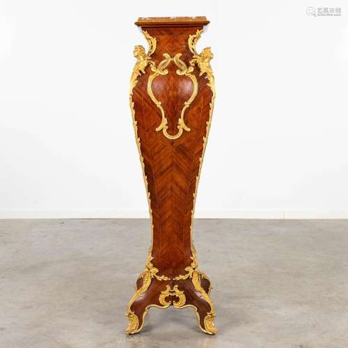 A pedestal, Louis XV style finished with rosewood inlay and ...