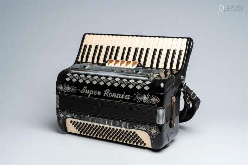 An Italian 'Super Ronnéa' chromatic accordion with piano key...