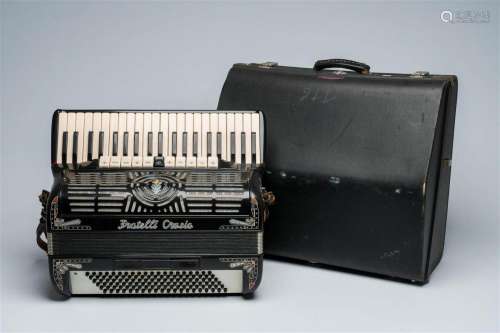 An Italian 'Fratelli Crosio' chromatic accordion with piano ...