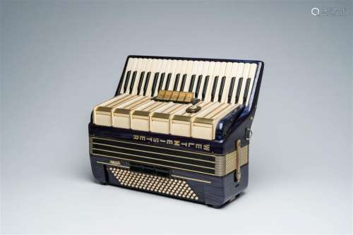 A 'Weltmeister' chromatic accordion with piano keyboard, ca....