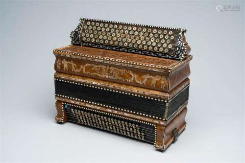 A Belgian 'August De Waele' chromatic accordion with button ...
