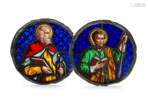 A pair of Gothic revival painted stained glass 'apostles' wi...