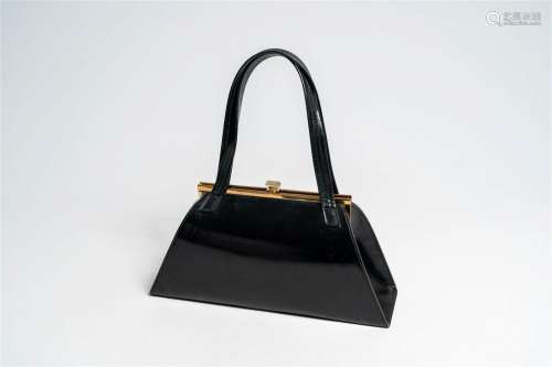 A black leather Delvaux handbag, 20th C.