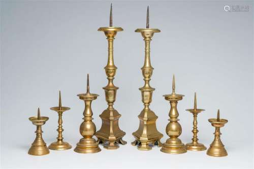 Four pairs of bronze pricket candlesticks, 17th C. and later
