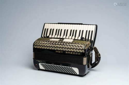 A 'Hohner Vox' chromatic accordion with piano keyboard, ca. ...