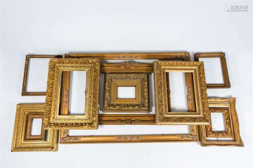 A varied collection of gilt wood frames in various styles, 1...