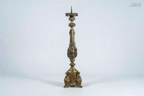 An Italian carved and polychrome painted floor altar pricket...