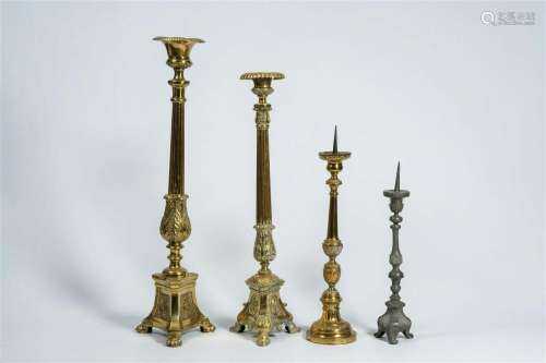 Four various brass and pewter church candlesticks, 19th/20th...