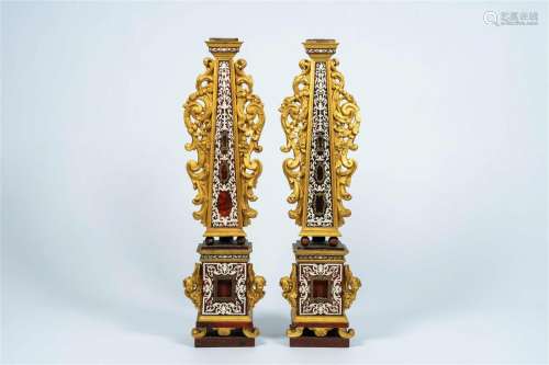 A pair of Flemish gilt and patinated wood obelisk-shaped tor...