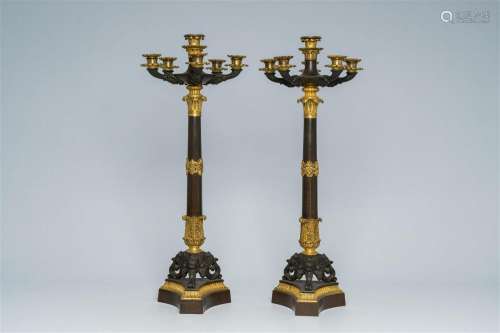 A pair of French gilt and patinated bronze six-light candela...