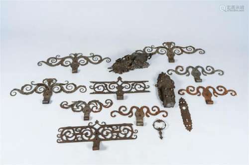 A varied collection of cast iron locks and hinges, 19th C.