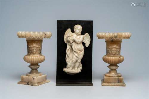 A pair of Italian Medici alabaster 'mascaron' vases and a ma...
