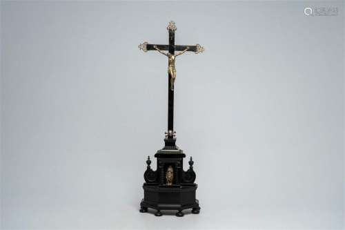 A Flemish ebonised wood silver-plated copper mounted crucifi...