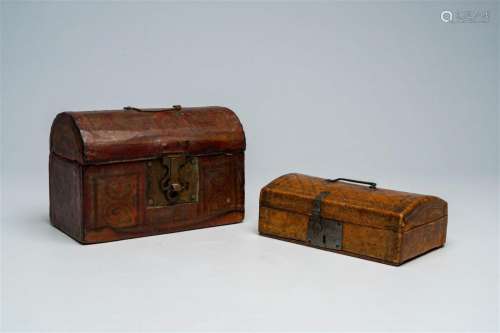 Two leather-upholstered wood coffers, 19th/20th C.