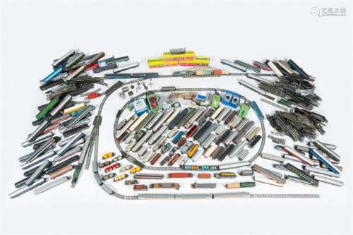 A large and varied collection of toy trains and attributes, ...