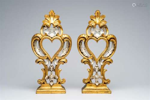 A pair of Italian Rococo carved, silver-plated and gilt wood...