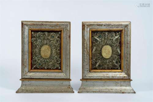 A pair of Austrian patinated and gilt wood reliquaries with ...