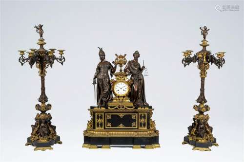 A monumental French gilt and patinated bronze and black marb...