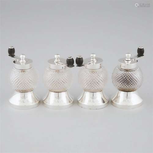 Four Victorian Silver and Cut Glass Pepper Mills, Hukin &...