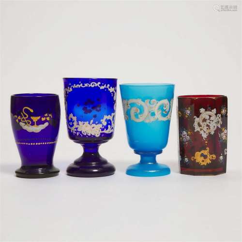 Four Bohemian Enameled and Gilt Blue or Red Glass Goblets,