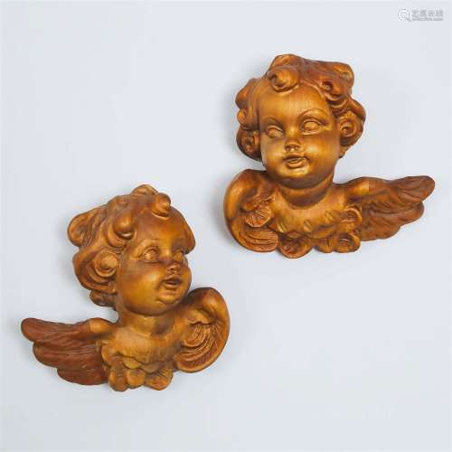 Pair of Italian Baroque Style Carved Walnut Winged Cherubic