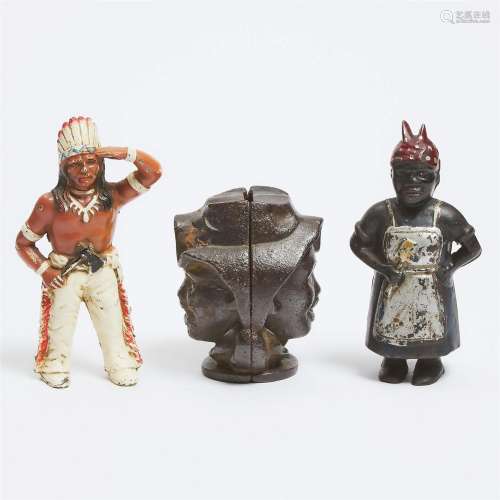 Two Painted Cast Iron Figural Still Banks and a Head Form B