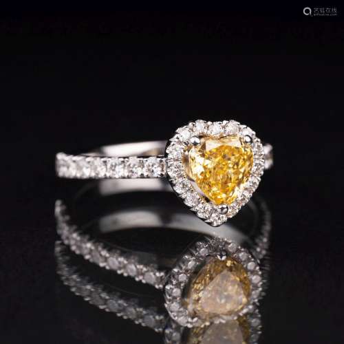 A heartshaped Fancy Intense Diamond Ring.