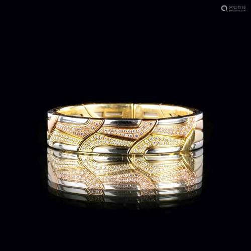 Bucherer. A Tricolour Bangle Bracelet with Diamonds 'Swan Ri...