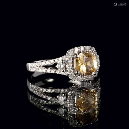 A Yellow Sapphire Diamond Ring.