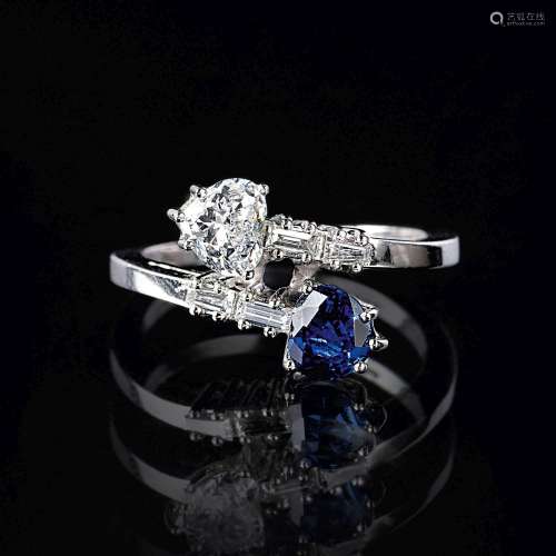 A Toi-et-Moi Ring with Hearts of Sapphire and Diamond.