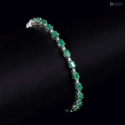 An Emerald Diamond Bracelet.