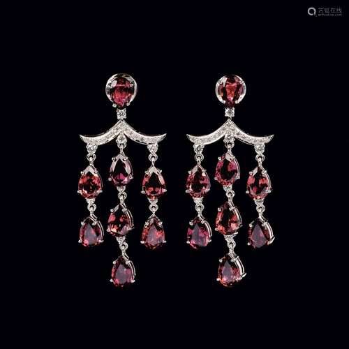 A Pair of colourfine Rubellith Earpendants with Diamonds.