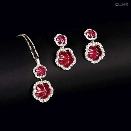 A Flowershaped Ruby Diamond Jewellery Set: Pendant on Neckla...