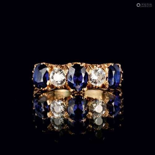 A Natural Sapphire Ring with Old Cut Diamonds.