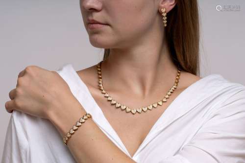 A Diamond Demi Parure with Hearts: Bracelet, Necklace and Ea...