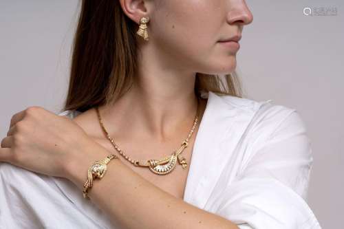 A Highcarat Diamond Demi Parure: Necklace, Bracelet and Earr...