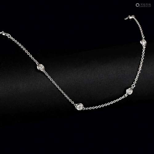 A long Diamond Necklace.