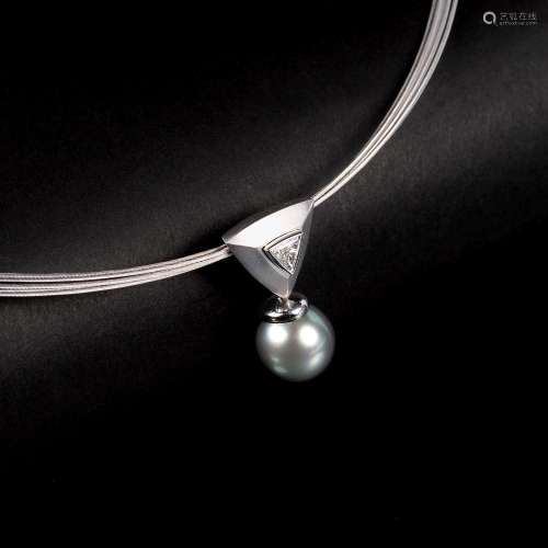A Diamond Pendant with Tahiti Pearl on Gold Necklace.