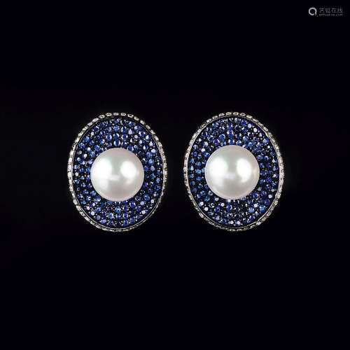 A Pair of Pearl Earrings with Sapphires and Diamonds.