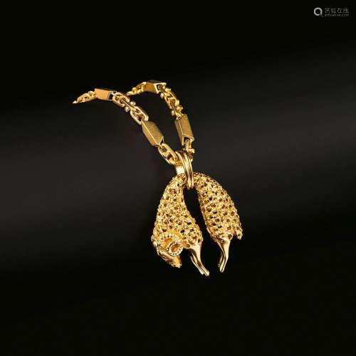 Cartier. A Pendant 'Toison d'Or' on long Gold Necklace.