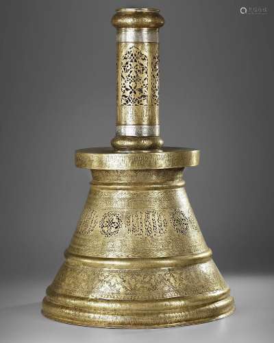 A LARGE MAMLUK STYLE SILVER-INLAID BRASS CANDLESTICK, 20TH C...